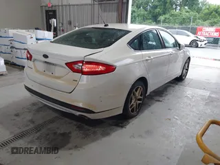 2016 Ford Fusion SE with VIN 1FA6P0H77G5114717, listed as a IAAI auction lot 42166800 with 186,610 mi miles and . Bid and sale history available at DreamBid. Image 4.
