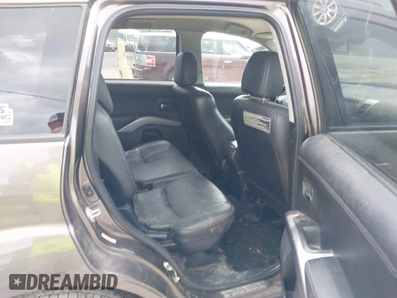 2010 Mitsubishi Outlander XLS z VIN JA4JT4AX6AZ003099, wystawiony jako IAAI lot #42458993 z przebiegiem 218 614 mil mil oraz . Historia ofert i sprzedaży dostępna na DreamBid. Obrazek 8.