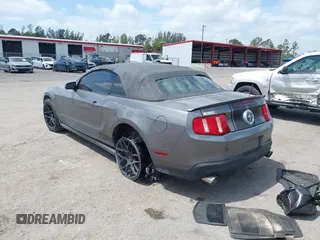 2010 Ford Mustang V6 with VIN 1ZVBP8EN1A5178265, listed as a IAAI auction lot 42107186 with 143,556 mi miles. Bid and sale history available at carsss.com. Image 3.