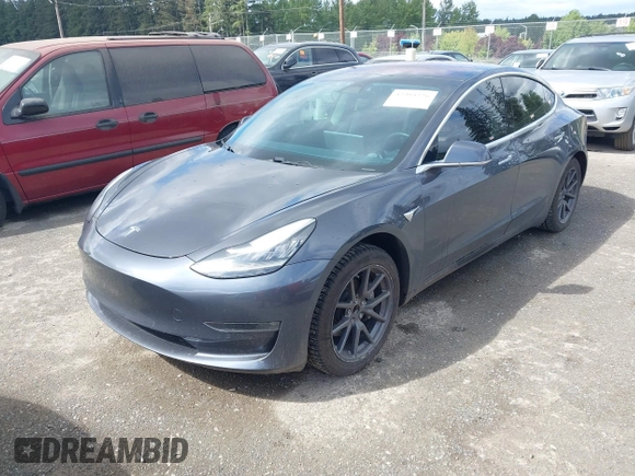 2018 Tesla Model 3 Long Range Battery z VIN 5YJ3E1EA2JF011588, wystawiony jako IAAI lot #42304226 z przebiegiem 56 819 mil mil oraz . Historia ofert i sprzedaży dostępna na DreamBid. Obrazek 19.