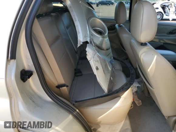 2005 Ford Escape Limited with VIN 1FMYU94195KB35872, listed as a Copart auction lot 63285755 with 145,638 mi miles and Salvage title. Bid and sale history available at DreamBid. Image 11.