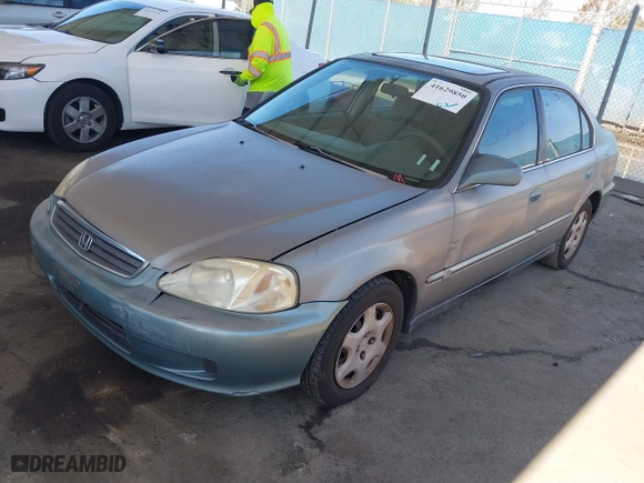 1999 Honda Civic EX with VIN 2HGEJ8640XH505636, listed as a IAAI auction lot 41629850 with 369,637 mi miles. Bid and sale history available at carsss.com. Image 2.