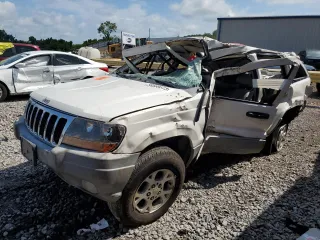 2000 Jeep Grand Cherokee Laredo z VIN 1J4G248S1YC329509, wystawiony jako Copart lot #58589373 z przebiegiem Nie podano mil oraz Szkoda całkowita • Salvage title. Historia ofert i sprzedaży dostępna na DreamBid. Obrazek 1.