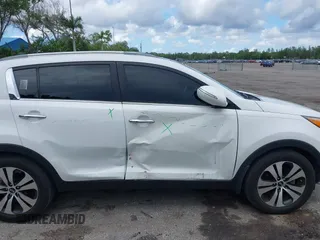 2013 Kia Sportage EX with VIN KNDPC3A21D7528487, listed as a IAAI auction lot 42556813 with 144,823 mi miles and . Bid and sale history available at DreamBid. Image 6.