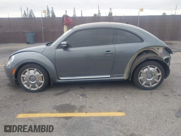 2013 Volkswagen Beetle 2.5L with VIN 3VWJP7AT6DM667477, listed as a IAAI auction lot 42215545 with 87,392 mi miles and . Bid and sale history available at DreamBid. Image 14.