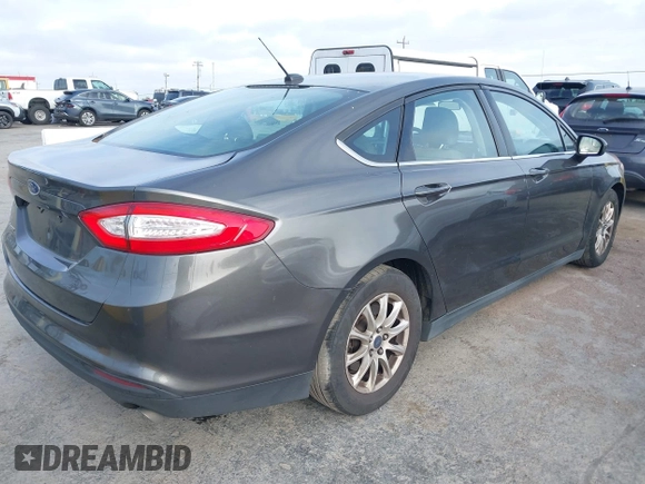 2015 Ford Fusion S with VIN 3FA6P0G7XFR264723, listed as a IAAI auction lot 42057756 with 174,593 mi miles and . Bid and sale history available at DreamBid. Image 4.
