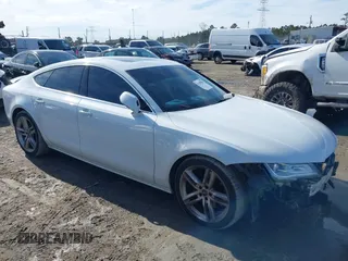 2014 Audi A7 3.0 TDI Premium Plus with VIN WAUWMAFC4EN016831, listed as a IAAI auction lot 41290261 with 234,095 mi miles. Bid and sale history available at carsss.com. Image 13.