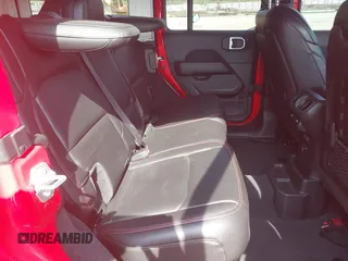 2022 Jeep Wrangler Unlimited Rubicon with VIN 1C4HJXFG0NW100620, listed as a IAAI auction lot 42534993 with 21,614 mi miles and . Bid and sale history available at DreamBid. Image 8.