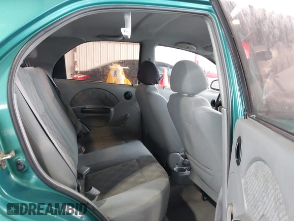 2004 Chevrolet Aveo with VIN KL1TD52664B200365, listed as a IAAI auction lot 41904540 with 104,440 mi miles and . Bid and sale history available at DreamBid. Image 8.