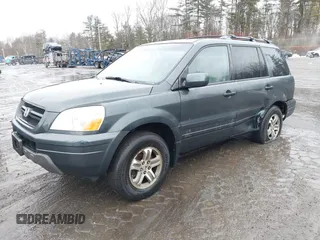 2003 Honda Pilot EX with VIN 2HKYF184X3H561179, listed as a IAAI auction lot 41709312 with 302,368 mi miles. Bid and sale history available at carsss.com. Image 2.