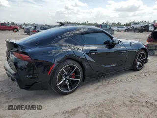 2021 Toyota GR Supra 3.0 with VIN WZ1DB0C00MW042681, listed as a Copart auction lot 59174324 with 7,718 mi miles and Salvage Title. Bid and sale history available at carsss.com. Image 3.