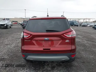 2016 Ford Escape SE with VIN 1FMCU9GX8GUB28820, listed as a IAAI auction lot 40874359 with 134,459 mi miles. Bid and sale history available at carsss.com. Image 16.
