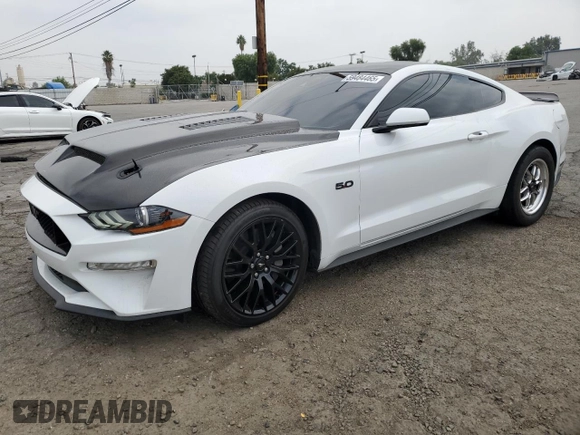 2021 Ford Mustang GT z VIN 1FA6P8CF7M5154451, wystawiony jako Copart lot #59484465 z przebiegiem 26 817 mil mil oraz Szkoda całkowita • Salvage title. Historia ofert i sprzedaży dostępna na DreamBid. Obrazek 1.