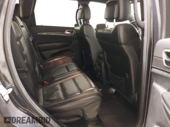 2016 Jeep Grand Cherokee Limited 75th Anniversary with VIN 1C4RJFBG7GC392288, listed as a IAAI auction lot 41560116 with 127,304 mi miles and . Bid and sale history available at DreamBid. Image 8.