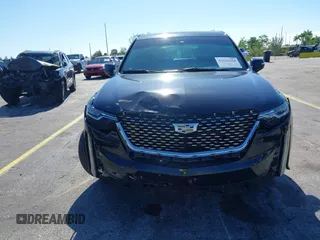 2020 Cadillac XT6 FWD Premium Luxury with VIN 1GYKPCRS7LZ211197, listed as a IAAI auction lot 42231424 with 57,351 mi miles and . Bid and sale history available at DreamBid. Image 6.
