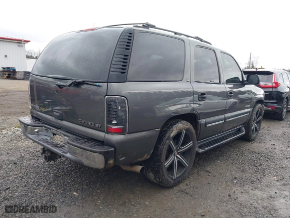 2001 Chevrolet Tahoe LS with VIN 1GNEK13T31R119807, listed as a IAAI auction lot 41342701 with 306,277 mi miles. Bid and sale history available at carsss.com. Image 4.