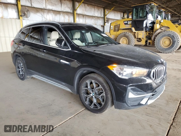2021 BMW X1 sDrive28i z VIN WBXJG7C02M5S30154, wystawiony jako Copart lot #56076565 z przebiegiem 57 671 mil mil oraz Tytuł czysty. Historia ofert i sprzedaży dostępna na DreamBid. Obrazek 4.