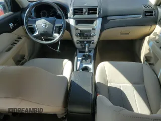 2010 Mercury Milan z VIN 3MEHM0HA3AR607241, wystawiony jako Copart lot #61225435 z przebiegiem 111 038 mil mil oraz Szkoda całkowita • Salvage title. Historia ofert i sprzedaży dostępna na DreamBid. Obrazek 8.