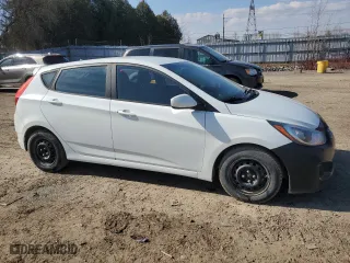 2014 Hyundai Accent GS with VIN KMHCT5AE7EU154616, listed as a Copart auction lot 51067035 with 243,524 mi miles and Clean Title. Bid and sale history available at carsss.com. Image 4.