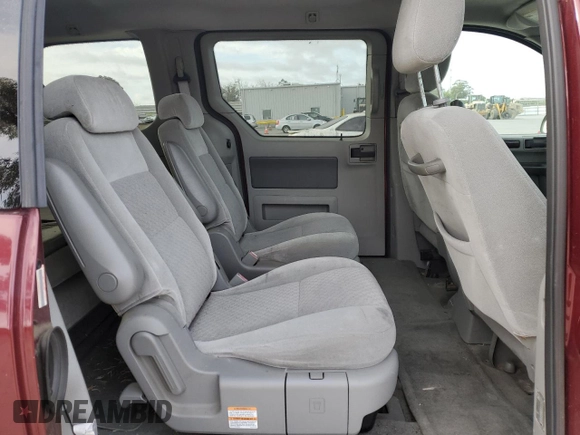 2006 Ford Freestar SEL z VIN 2FMZA52206BA23717, wystawiony jako Copart lot #53404515 z przebiegiem 117 402 mil mil oraz Czysty tytuł • Clean title. Historia ofert i sprzedaży dostępna na DreamBid. Obrazek 11.