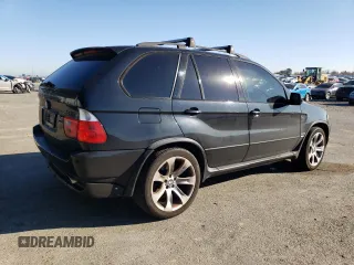 2005 BMW X5 4.8is with VIN 5UXFA93515LE83489, listed as a Copart auction lot 87840265 with 131,786 mi miles and Salvage Title. Bid and sale history available at carsss.com. Image 3.