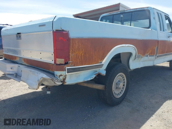 1986 Ford F-150 with VIN 1FTEX14N8GKA92289, listed as a IAAI auction lot 42089084 with 33,539 mi miles. Bid and sale history available at carsss.com. Image 6.