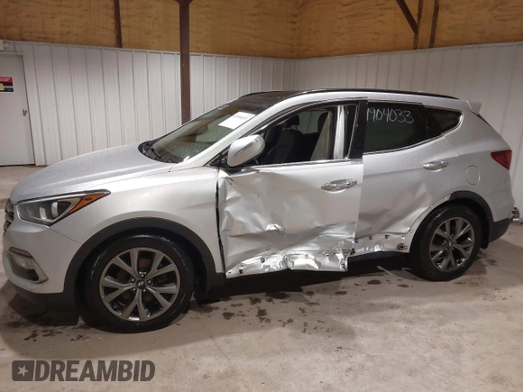 2018 Hyundai Santa Fe Ultimate with VIN 5XYZWDLA9JG502177, listed as a IAAI auction lot 41904033 with 68,000 mi miles and . Bid and sale history available at DreamBid. Image 6.