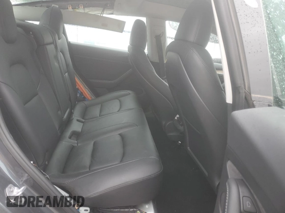 2023 Tesla Model 3 z VIN 5YJ3E1EA9PF699744, wystawiony jako Copart lot #56407215 z przebiegiem 5 201 mil mil oraz Szkoda całkowita • Salvage title. Historia ofert i sprzedaży dostępna na DreamBid. Obrazek 10.