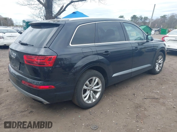 2019 Audi Q7 Premium with VIN WA1AAAF74KD002299, listed as a IAAI auction lot 42066717 with 91,898 mi miles and . Bid and sale history available at DreamBid. Image 4.