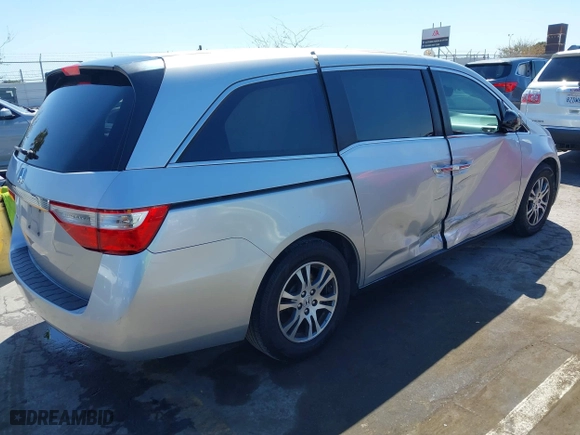 2012 Honda Odyssey EX with VIN 5FNRL5H48CB023003, listed as a IAAI auction lot 41975027 with 221,313 mi miles. Bid and sale history available at carsss.com. Image 4.