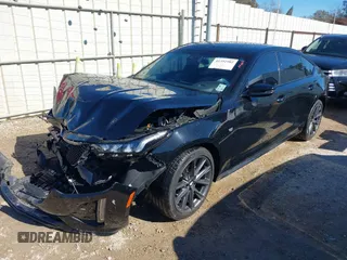2024 Cadillac CT5 Sport z VIN 1G6DP5RK3R0127419, wystawiony jako IAAI lot #41392902 z przebiegiem 17 829 mil mil oraz . Historia ofert i sprzedaży dostępna na DreamBid. Obrazek 18.