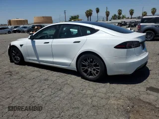 2023 Tesla Model S z VIN 5YJSA1E58PF500032, wystawiony jako Copart lot #57532955 z przebiegiem Nie podano mil oraz Szkoda całkowita • Salvage title. Historia ofert i sprzedaży dostępna na DreamBid. Obrazek 2.
