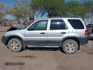 2006 Ford Escape XLT z VIN 1FMCU93136KC15231, wystawiony jako IAAI lot #42625410 z przebiegiem 117 479 mil mil oraz . Historia ofert i sprzedaży dostępna na DreamBid. Obrazek 15.