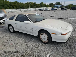 1989 Toyota Supra z VIN JT2MA71J5K0116367, wystawiony jako Copart lot #71280374 z przebiegiem Nie podano mil oraz Szkoda całkowita • Salvage title. Historia ofert i sprzedaży dostępna na DreamBid. Obrazek 4.