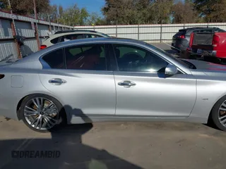 2019 Infiniti Q50 Luxe z VIN JN1EV7AP4KM518705, wystawiony jako IAAI lot #40957491 z przebiegiem 49 576 mil mil oraz . Historia ofert i sprzedaży dostępna na DreamBid. Obrazek 14.