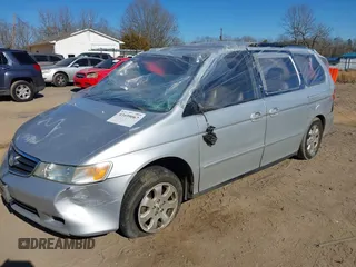 2004 Honda Odyssey EX-L with VIN 5FNRL18924B107971, listed as a IAAI auction lot 41699067 with Not Provided miles and . Bid and sale history available at DreamBid. Image 2.