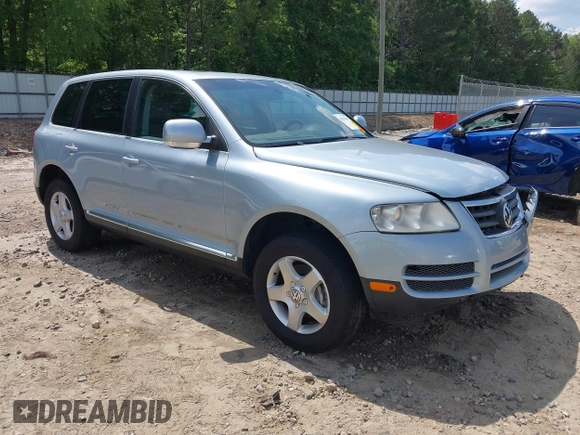 2007 Volkswagen Touareg V6 z VIN WVGZE77L57D000964, wystawiony jako IAAI lot #42159667 z przebiegiem 143 542 mil mil oraz . Historia ofert i sprzedaży dostępna na DreamBid. Obrazek 1.