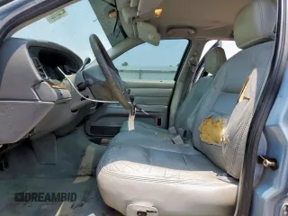 2004 Ford Crown Victoria LX z VIN 2FAFP74W54X184815, wystawiony jako Copart lot #57280725 z przebiegiem 294 513 mil mil oraz Szkoda całkowita • Salvage title. Historia ofert i sprzedaży dostępna na DreamBid. Obrazek 7.