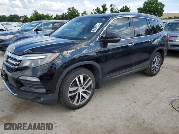 2017 Honda Pilot Touring with VIN 5FNYF6H99HB018503, listed as a Copart auction lot 63087025 with 369,312 mi miles and Clean title. Bid and sale history available at DreamBid. Image 1.