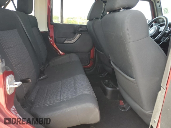 2012 Jeep Wrangler Unlimited Sport z VIN 1C4BJWDG7CL214633, wystawiony jako Copart lot #54547655 z przebiegiem 80 720 mil mil oraz Szkoda całkowita • Salvage title. Historia ofert i sprzedaży dostępna na DreamBid. Obrazek 11.