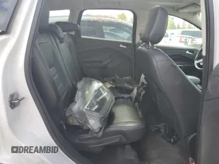 2018 Ford Escape Titanium z VIN 1FMCU9J94JUD09141, wystawiony jako Copart lot #56625805 z przebiegiem Nie podano mil oraz Szkoda całkowita • Salvage title. Historia ofert i sprzedaży dostępna na DreamBid. Obrazek 11.