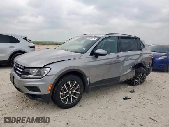 2021 Volkswagen Tiguan S with VIN 3VV1B7AX0MM033300, listed as a Copart auction lot 57270715 with 70,125 mi miles and Salvage title. Bid and sale history available at DreamBid. Image 1.