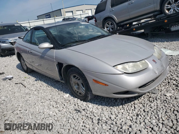 2001 Saturn SC z VIN 1G8ZR12711Z109068, wystawiony jako Copart lot #72353914 z przebiegiem 116 559 mil mil oraz Szkody całkowita. Historia ofert i sprzedaży dostępna na DreamBid. Obrazek 4.