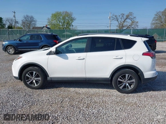 2018 Toyota RAV4 XLE with VIN 2T3WFREV2JW412970, listed as a IAAI auction lot 41986122 with 61,828 mi miles. Bid and sale history available at carsss.com. Image 14.