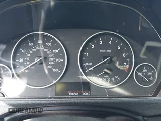 2015 BMW 3 Series 328i with VIN WBA3A5C59FF609332, listed as a IAAI auction lot 41994091 with 194,245 mi miles. Bid and sale history available at carsss.com. Image 7.