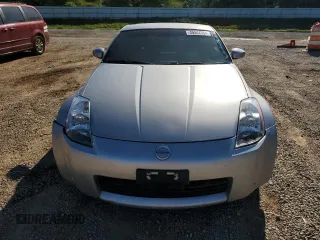 2004 Nissan 350Z Touring with VIN JN1AZ34E54T061403, listed as a Copart auction lot 57346704 with 127,602 mi miles and Salvage Title. Bid and sale history available at carsss.com. Image 5.
