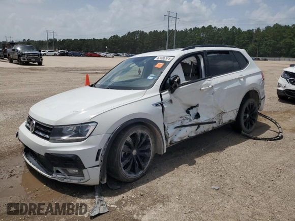 2021 Volkswagen Tiguan SE with VIN 3VV3B7AX7MM130227, listed as a Copart auction lot 63086575 with 80,135 mi miles and Salvage title. Bid and sale history available at DreamBid. Image 1.
