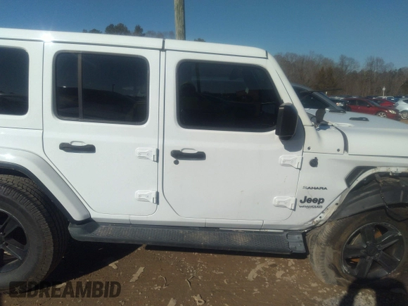 2018 Jeep Wrangler Unlimited Sahara z VIN 1C4HJXEG0JW207873, wystawiony jako IAAI lot #41213655 z przebiegiem 61 043 mil mil oraz . Historia ofert i sprzedaży dostępna na DreamBid. Obrazek 13.