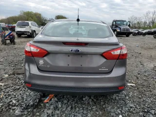 2013 Ford Focus SE with VIN 1FADP3F28DL241404, listed as a Copart auction lot 52759075 with 105,658 mi miles and Salvage Title. Bid and sale history available at carsss.com. Image 6.