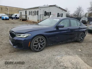 2021 BMW 5 Series M550i xDrive z VIN WBA13BK03MCF67697, wystawiony jako Copart lot #81678634 z przebiegiem 61 398 mil mil oraz Szkoda całkowita • Salvage title. Historia ofert i sprzedaży dostępna na DreamBid. Obrazek 1.